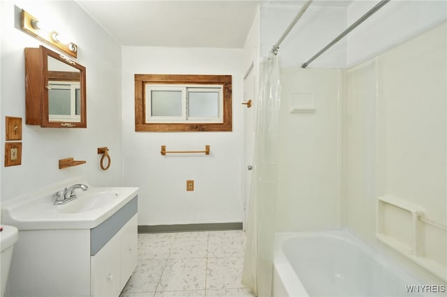 full bathroom featuring shower / tub combo with curtain, vanity, and toilet