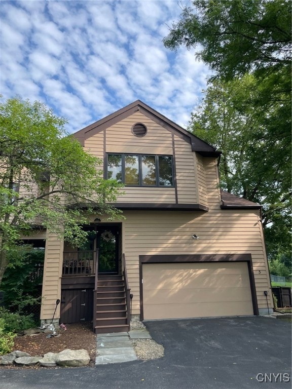 view of front of property with a garage