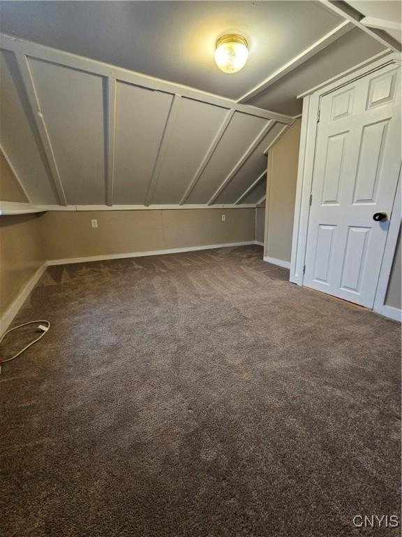 802 W End Ave, Wilna, NY 13619 - bonus room with lofted ceiling, baseboards, and carpet floors