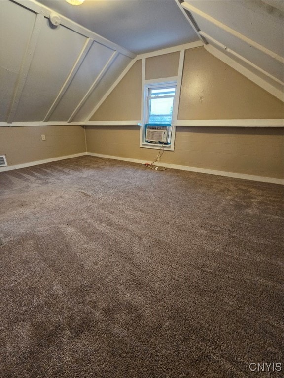 bonus room with carpet, vaulted ceiling, and cooling unit