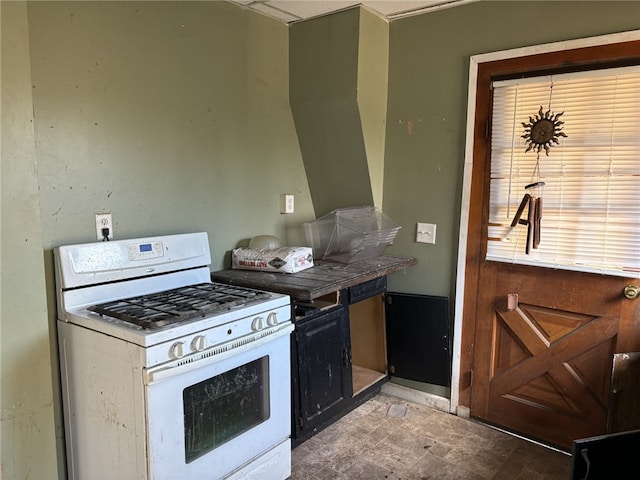 kitchen featuring white gas range