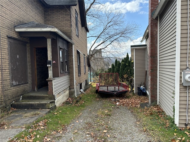 107 E Main St, Hornell, NY 14843 - view of property exterior featuring brick siding