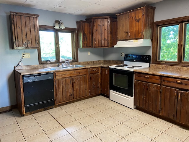 kitchen with sink, light tile patterned floors, electric range, black dishwasher, and range hood