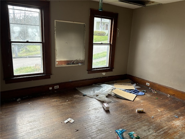 unfurnished room featuring hardwood / wood-style floors