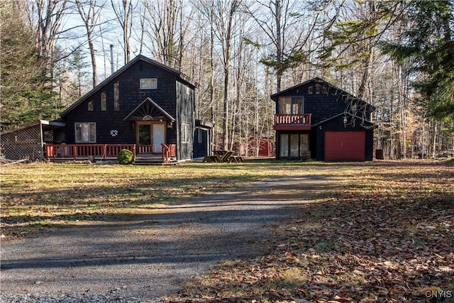 view of front of house with an outbuilding and a garage