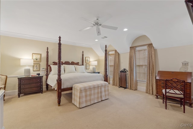 carpeted bedroom featuring crown molding, ceiling fan, and lofted ceiling