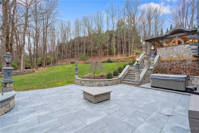 view of patio featuring a hot tub