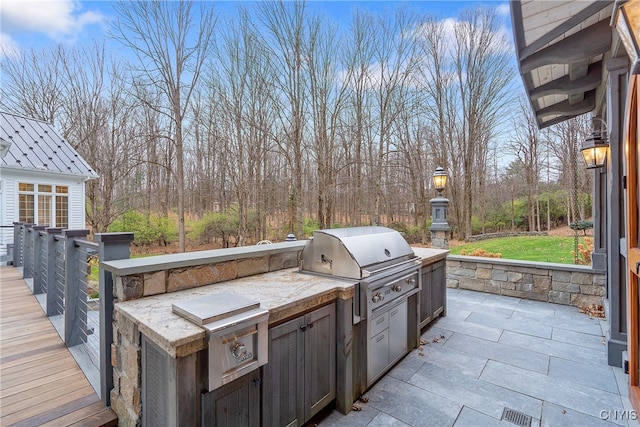 view of patio / terrace with grilling area and exterior kitchen