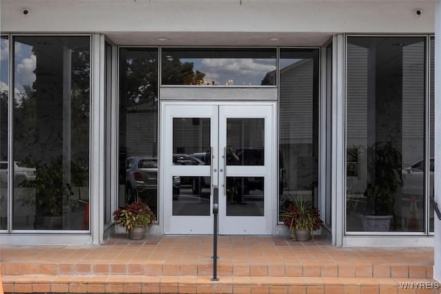 doorway to property featuring french doors