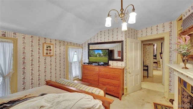 bedroom with light carpet, a chandelier, and vaulted ceiling