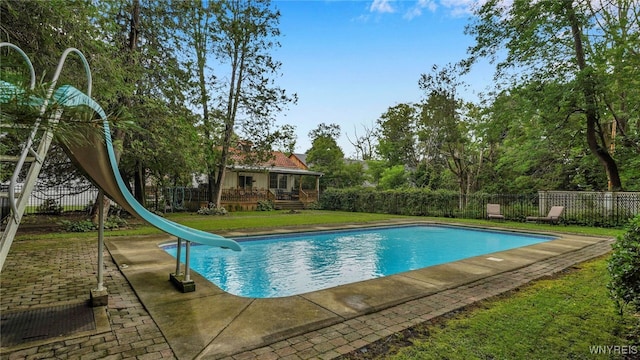 view of pool featuring a water slide