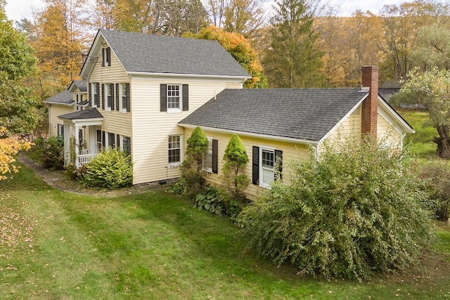 exterior space with a front lawn