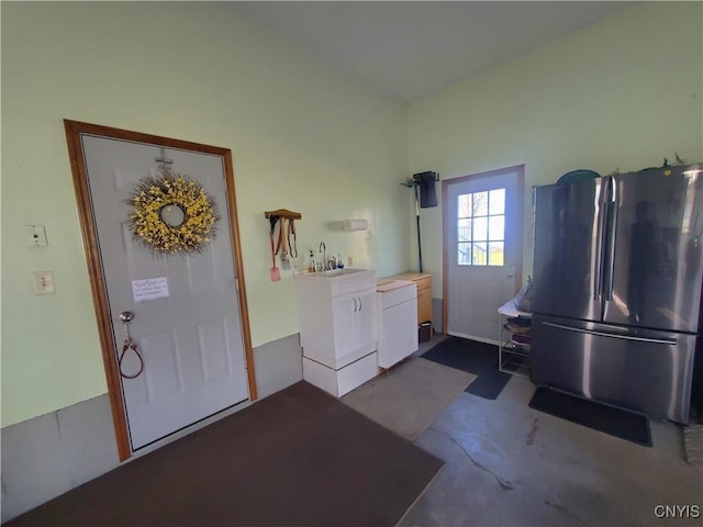 interior space featuring concrete flooring and sink