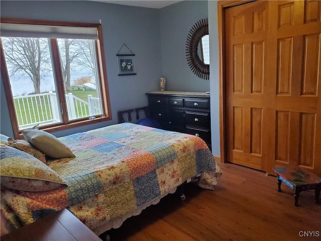 bedroom featuring hardwood / wood-style floors