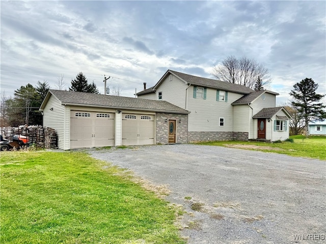 view of side of home featuring a garage and a lawn