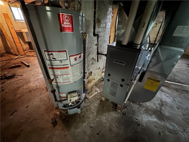 utility room featuring heating unit and water heater