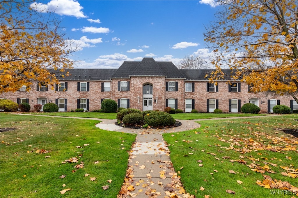 view of property with a front yard