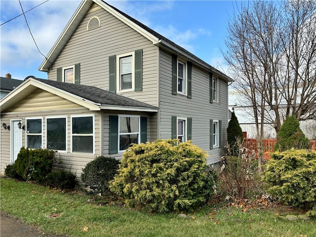 view of home's exterior featuring a yard