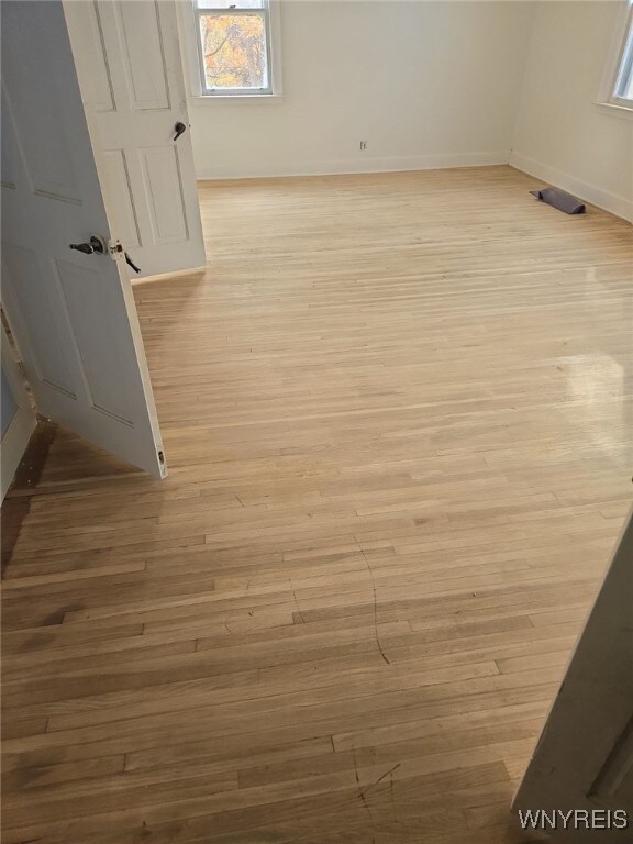 75 Schaefer Rd, West Seneca, NY 14218 - unfurnished room with light wood-type flooring and baseboards