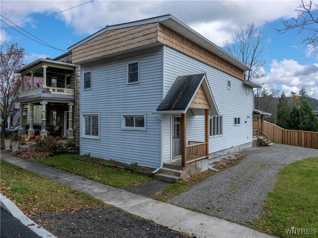 view of front of property with a balcony