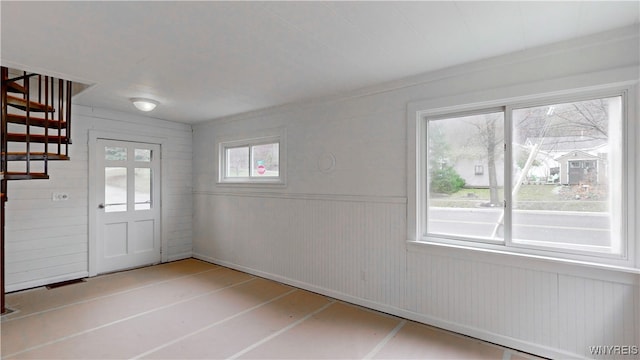 interior space featuring wooden walls