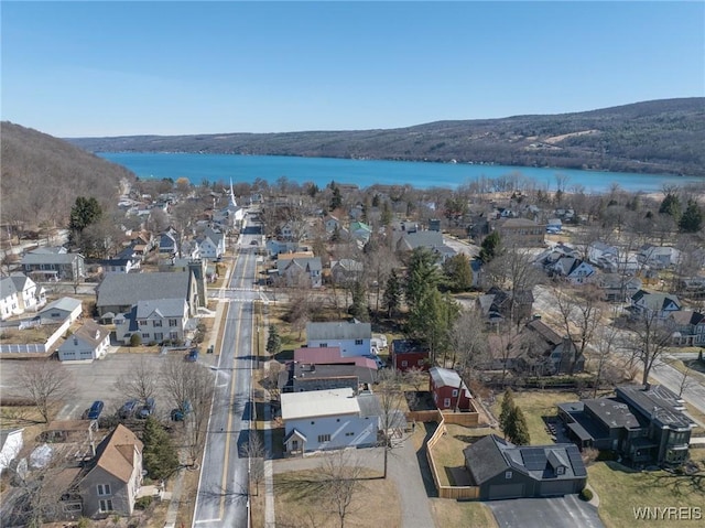 bird's eye view with a residential view and a water view