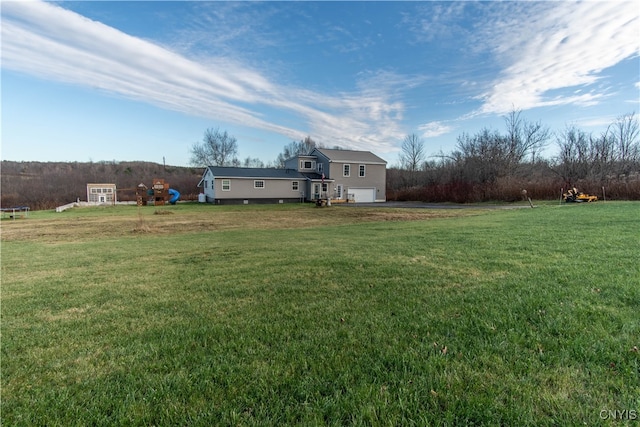 view of yard with a garage