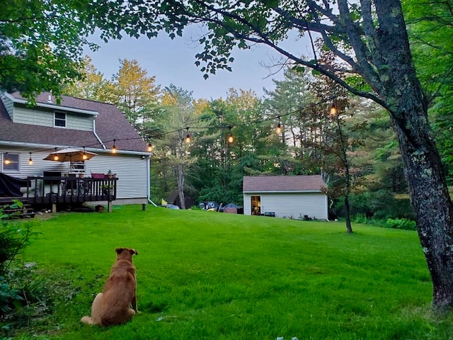 view of yard with a deck