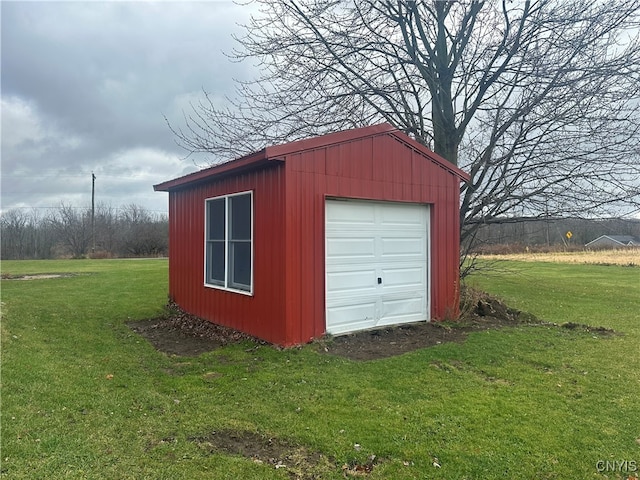 garage with a lawn