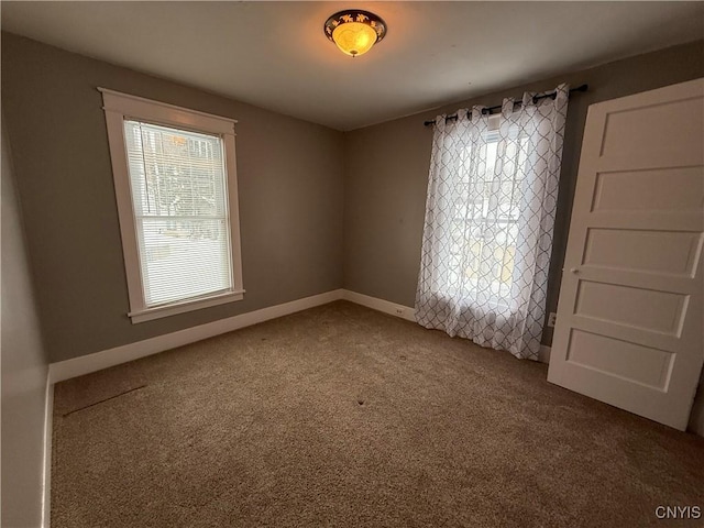 empty room with carpet floors