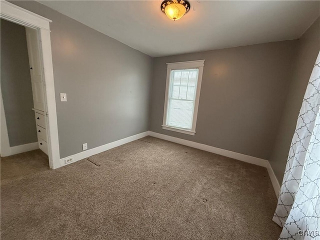 unfurnished bedroom featuring carpet floors