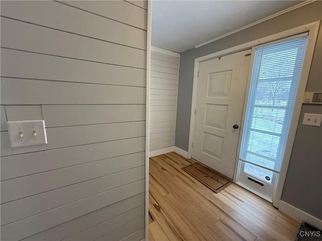 doorway with light hardwood / wood-style floors