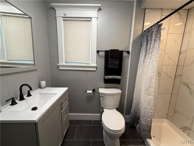 bathroom featuring vanity, tile patterned flooring, a shower with curtain, and toilet