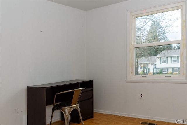 home office featuring light parquet floors