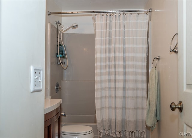 full bathroom with vanity, toilet, and shower / tub combo