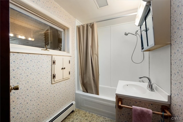 bathroom with shower / tub combo with curtain, vanity, and a baseboard heating unit