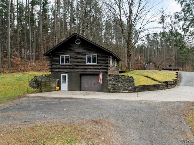 view of home's exterior with a garage