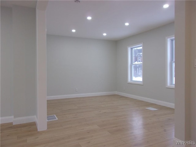 unfurnished room featuring light wood-type flooring