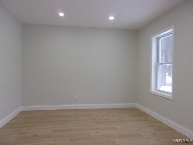 unfurnished room featuring light hardwood / wood-style flooring