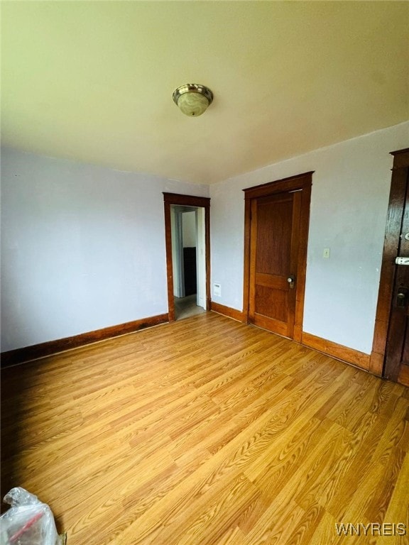 unfurnished bedroom with light hardwood / wood-style flooring