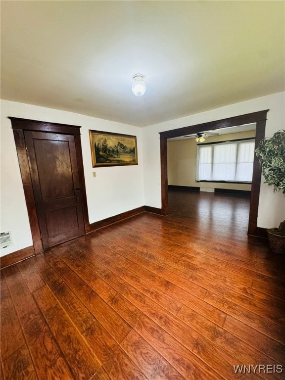 spare room with hardwood / wood-style floors