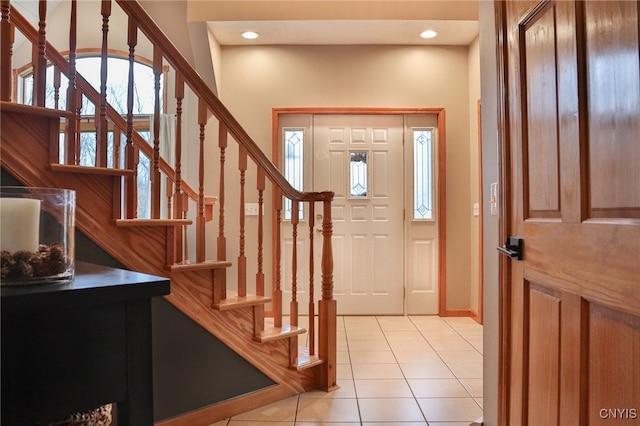 foyer entrance featuring light tile patterned floors