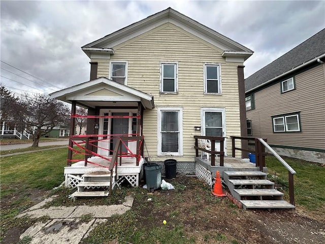 22 W William St, Bath, NY 14810 - rear view of property with a yard