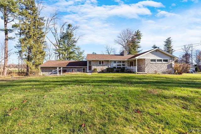 ranch-style home with a front yard