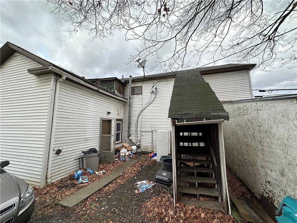 23 W William St, Bath, NY 14810 - back of house featuring a shingled roof