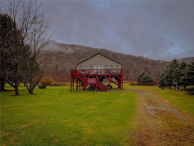 view of yard featuring a wooden deck