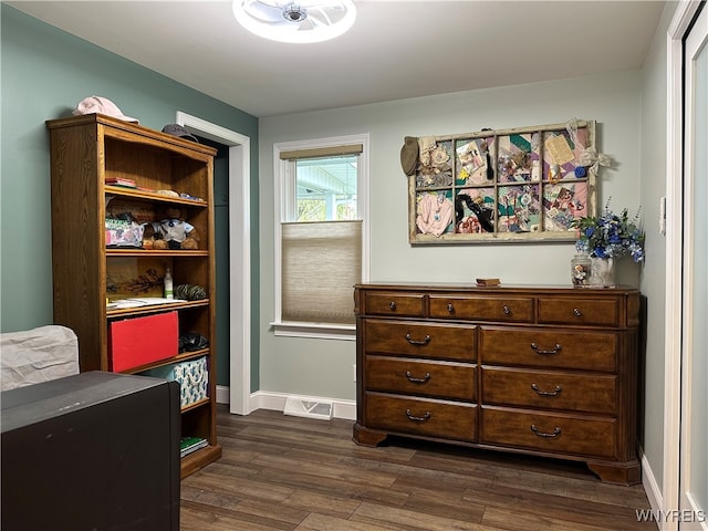 interior space with dark hardwood / wood-style floors