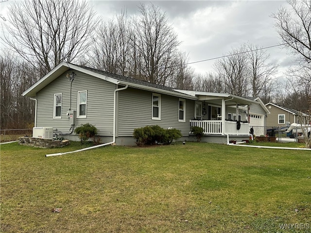 view of front facade with a front lawn and covered porch