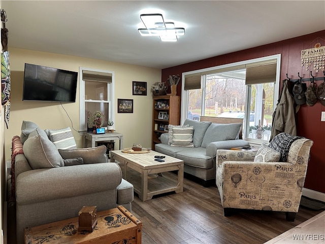 living room with dark wood-type flooring