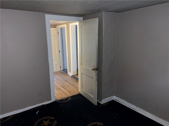 spare room featuring hardwood / wood-style flooring